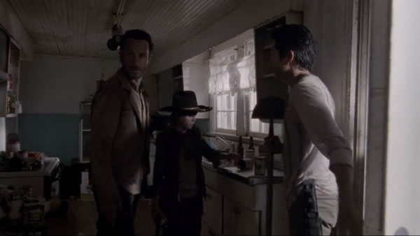 The Walking Dead Season 3, Episode 1: Rick and Carl checking out an abandoned kitchen for food while Glenn walks in with a looted lamp.