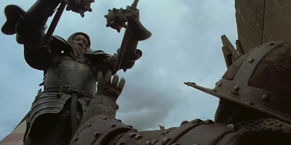 If he misses his target, he will likely hit his own groin. Scene from The Messenger: The Story of Joan of Arc (1999).