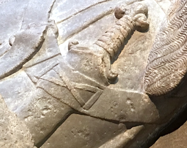 Closeup of the sword on the effigy of Jean d'Alluye